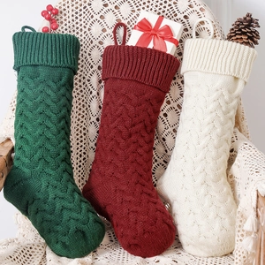 Classic 46cm cable knit Christmas stockings in red, green and white for holiday decoration