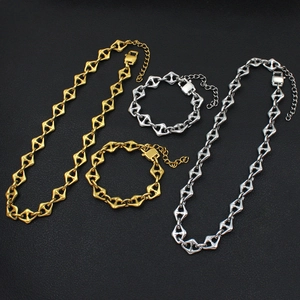 Geometric link chain jewelry set with gold and silver bracelets and necklaces