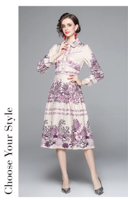 Detail of floral printed midi dress with long sleeves and purple patterns on cream fabric
