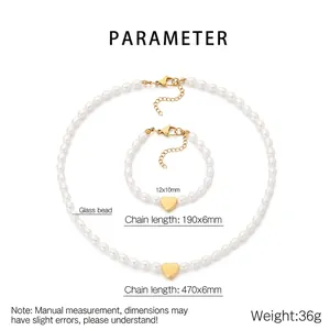 Detailed view of pearl glass bead jewelry set with gold heart pendants and dimensions