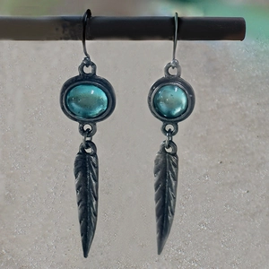 Vintage bohemian drop earrings with blue stone and feather charm in antique finish