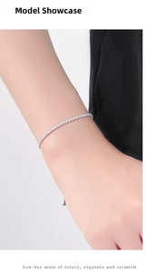 Close-up of S925 silver tennis bracelet with cubic zirconia and adjustable chain link