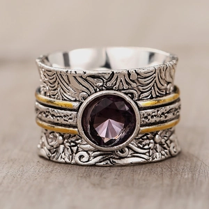 Vintage wide band ring with purple gemstone and two-tone engraved floral details