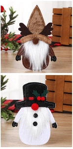 Dettaglio dei portaposate a forma di gnomo natalizio con corna e cappelli da pupazzo