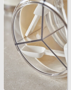 Close-up of moisture-proof seasoning box with three-compartment base and small spoons