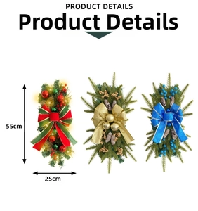 Close-up of Christmas teardrop wreaths with LED lights, ribbons and pine cones