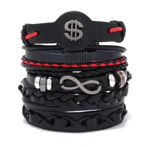 Detail of multi-layer leather bracelet set with metallic dollar and infinity symbols