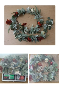Macro detail of artificial maple leaves, white pumpkins, and berries for autumn decor