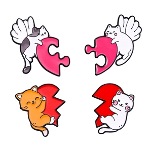 Cartoon enamel cat pins set featuring heart motifs and wings on white background