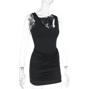 Detailed view of black bodycon dress featuring elastic ruching and slim fit design