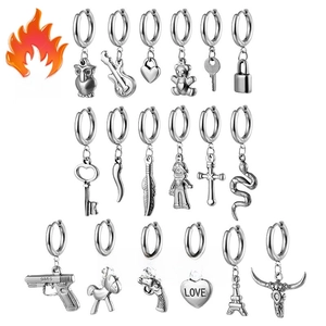 Detailed grid of silver stainless steel hoop earrings featuring diverse novelty charms