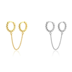 Macro shot of S925 sterling silver chain earrings in gold and silver finishes