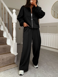 Women's casual black two-piece tracksuit set with zip-up hoodie and wide-leg sweatpants
