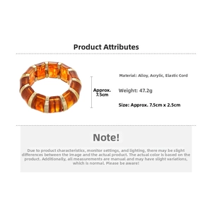 Detail view of amber acrylic stretch bracelet with gold alloy accents and dimensions