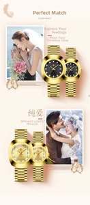 Detail of gold quartz couple watches with diamond markers and date display window