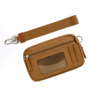 Brown nylon wristlet wallet featuring a clear ID window and detachable lanyard strap
