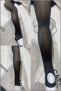 Detail view of black sheer stirrup leggings showing elastic ankle design on model
