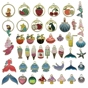 Detail of colorful enamel charms featuring mermaid, seashells and summer fruit designs