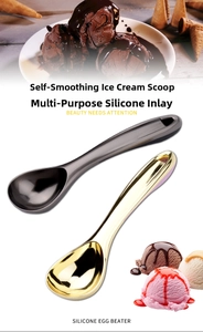 Detail of self-thawing ice cream scoops in gunmetal and gold with silicone grips