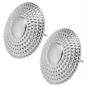 Detailed macro view of silver irregular round stud earrings with textured dot patterns