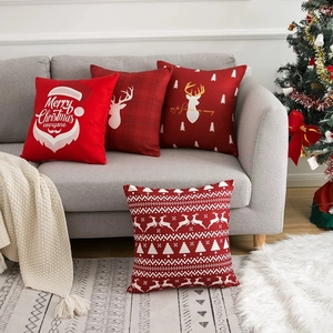 Set of 4 festive Christmas pillow covers with Santa, reindeer and snowflake patterns