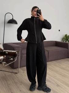 Slim fit black peplum zip-up hoodie and high waist wide leg sweatpants two-piece set