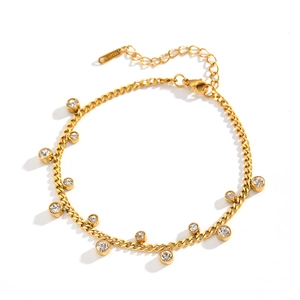 Golden stainless steel anklet with cubic zirconia stones displayed on white background