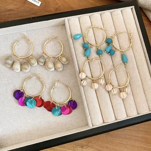 Gold-plated hoop earrings with shell and turquoise pendants in Bohemian style