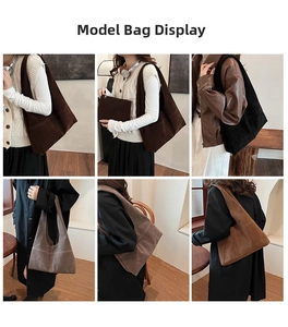 Detail of vintage suede shoulder bags in multiple colors shown on a model indoors