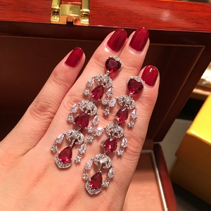Elegant long fringe drop earrings with deep red heart and teardrop zircons in silver setting