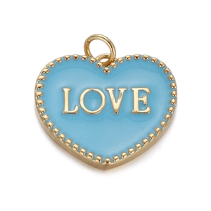 Detail of heart pendant with blue enamel and gold LOVE lettering on white background