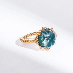 Exaggerated S925 silver ring in gold with green moss agate and white zircon accents