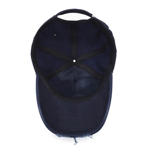 Navy blue vintage baseball cap with distressed brim and internal sweatband detail