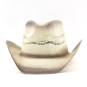 Classic woven straw cowboy hat in beige with brown gradient edges and cutout patterns
