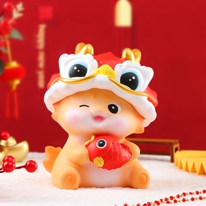 Detailed view of a cute cartoon tiger figurine holding a fish with New Year decor
