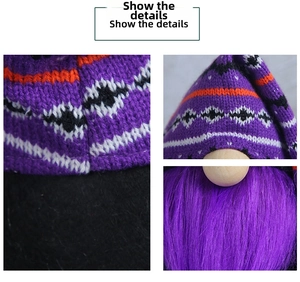 Macro shot of Halloween gnome showing purple knitted texture and long faux fur beard details
