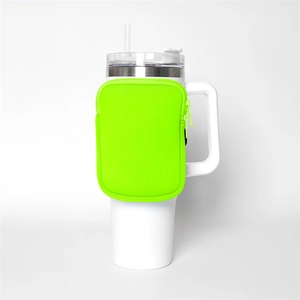 Detail of white 40oz tumbler with neon green neoprene zipper pouch attachment