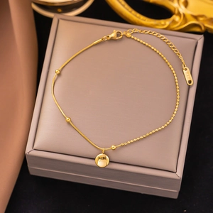 Minimalist gold titanium steel anklet with snake chain and round Lucky pendant