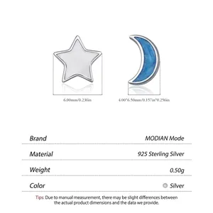 Asymmetric S925 sterling silver star and moon stud earrings with blue enamel and glitter