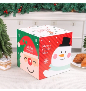 Detail of red and green Christmas gift boxes with Santa and Snowman illustrations