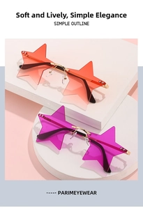 Close-up of star-shaped rimless sunglasses in orange gradient and bright purple lenses