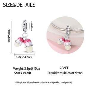 Macro detail of lily of the valley charm with pink enamel and size measurements