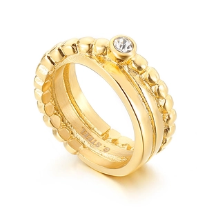 Golden double-layer stainless steel ring with beaded texture and a sparkling solitaire diamond