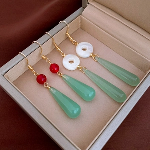 Elegant Chinese style resin jade teardrop earrings in golden finish and green stone