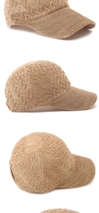 Detailed close-up of khaki knitted mesh baseball cap showing intricate geometric patterns