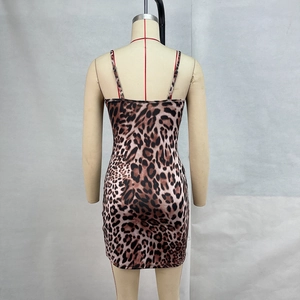Detailed close-up of leopard print bodycon mini dress with slim spaghetti straps
