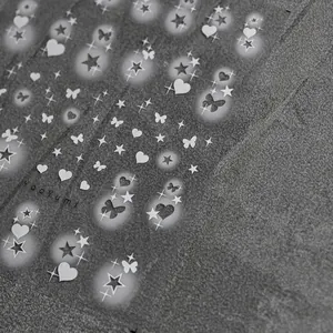 Detail of ultra-thin nail stickers with butterflies and stars patterns, model to3433
