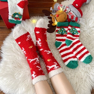 Festive Christmas coral fleece thermal socks featuring snowflakes and reindeer patterns