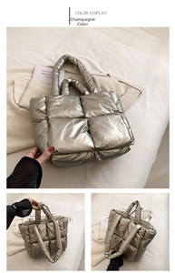 Detail of champagne metallic puffer tote bag with large quilted padded compartments