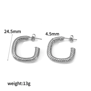 Silver C-shaped stainless steel earrings with textured geometric pattern in 24.5mm size